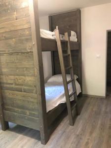 a couple of bunk beds in a room at CASA DELLE GUARDIE Rifugio in Madonna di Fornelli