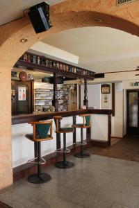 Lounge alebo bar v ubytovaní Gasthof-Cafe-Risano + 7 fotografií
