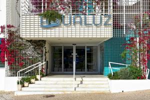 a entrance to a building with a sign on it at Aqualuz Lagos by The Editory in Lagos