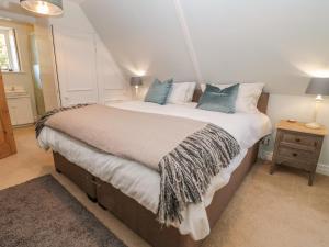 Säng eller sängar i ett rum på Fenwick Retreat at Fenwick Lodge