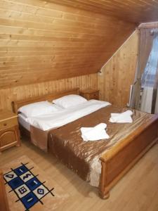 Postel nebo postele na pokoji v ubytování Deea Cascada