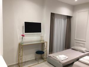 Postel nebo postele na pokoji v ubytování Onira luxury rooms