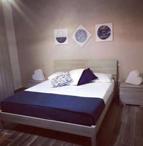 Un pat sau paturi într-o cameră la Relais al borgo