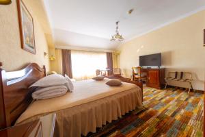 TV a/nebo společenská místnost v ubytování Vila Preciosa