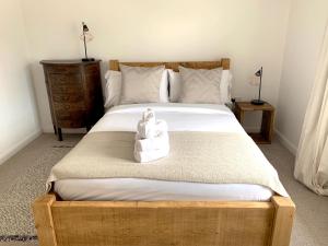 Un ou plusieurs lits dans un hébergement de l'établissement Home Crowd Luxury Apartments- Auckley House