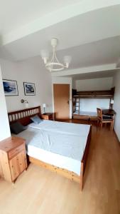 Postel nebo postele na pokoji v ubytování Apartmánový dom Tatran, Apartmán A32