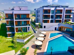 Bazén v ubytování Green Hills Suites nebo v jeho okolí