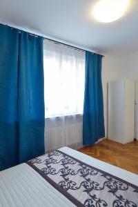 Posteľ alebo postele v izbe v ubytovaní Modern Apartment Navrátilova II