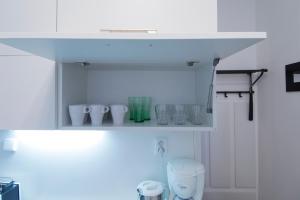 Kuchyňa alebo kuchynka v ubytovaní Modern Apartment Navrátilova II
