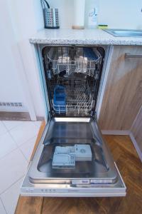 Kuchyňa alebo kuchynka v ubytovaní Modern Apartment Navrátilova II