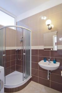 Kúpeľňa v ubytovaní Modern Apartment Navrátilova II