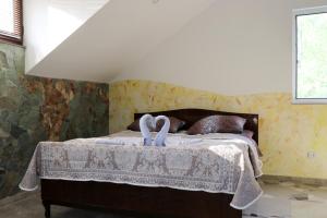 Säng eller sängar i ett rum på Orbategh Hotel Resort