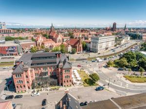 an aerial view of a city with a street at Craft Beer Central Hotel in Gdańsk