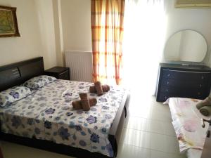 Postel nebo postele na pokoji v ubytování Villa Natali