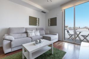 
Area soggiorno di Rent Top Apartments near Plaza de Catalunya
