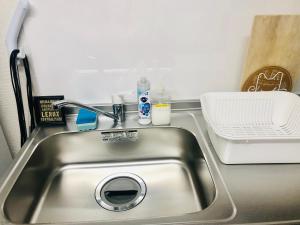 a stainless steel sink in a small kitchen at 板橋 RCアネックス Rc302 in Tokyo +31 photos