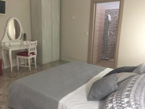 Postel nebo postele na pokoji v ubytování B&B Amores