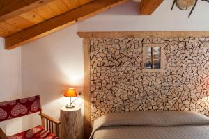 Postel nebo postele na pokoji v ubytování Albergo Lozen