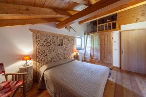 Postel nebo postele na pokoji v ubytování Albergo Lozen