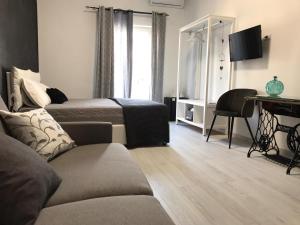 Posezení v ubytování B&B Le Stanze Al Centro