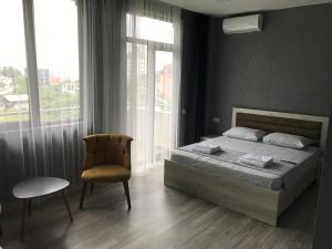 Voodi või voodid majutusasutuse Hotel FLEUR DE LIS toas