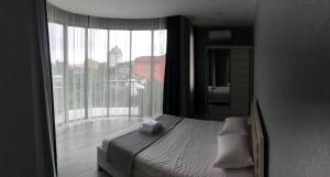 Voodi või voodid majutusasutuse Hotel FLEUR DE LIS toas