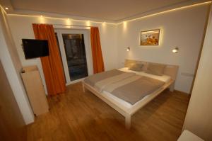Postel nebo postele na pokoji v ubytování Alpenmond Appartment Halbmond