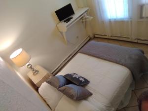 Postel nebo postele na pokoji v ubytování Cappuccio Hotel