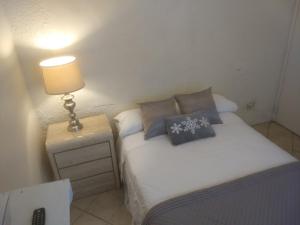 Postel nebo postele na pokoji v ubytování Cappuccio Hotel
