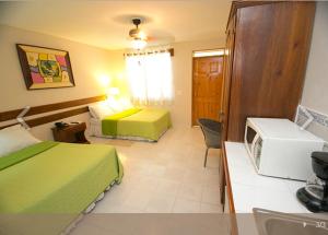 Φωτογραφία από το άλμπουμ του Palm Inn Hotel στο Πορτ-ο-Πρενς +16 φωτογραφίες