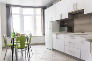 Kuchyň nebo kuchyňský kout v ubytování Apartments Roksolany 16 + 11 fotografií
