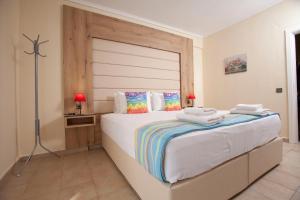 Posteľ alebo postele v izbe v ubytovaní Seven Heaven Premium Suites