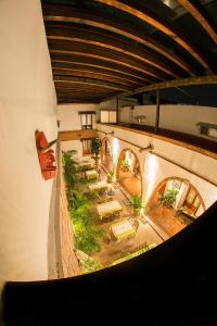 an overhead view of a building with a patio at Hotel Mesón de los Remedios in Morelia