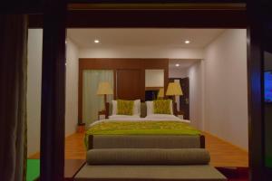 Llit o llits en una habitació de The Sultan Resort