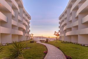 uma representação do exterior de um grande edifício de apartamentos em Casa Andina Select Paracas em Paracas