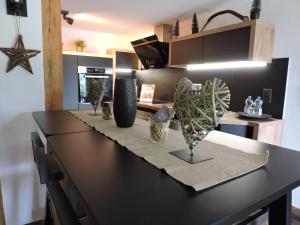 Chalet L'Escapadeにあるキッチンまたは簡易キッチン