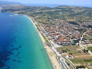 an aerial view of a beach and the ocean at Summer Den in Ierissos