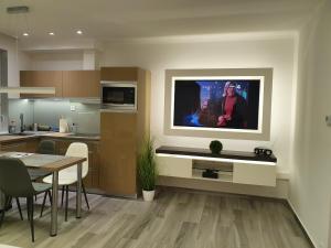 A kitchen or kitchenette at gyorapartman-TOP