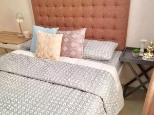 Ένα ή περισσότερα κρεβάτια σε δωμάτιο στο Super Cute Hampton Suites