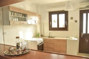 ルートラ・オレアス・エレニスにあるNanSea Apartmentのギャラリーの写真 +3枚の写真