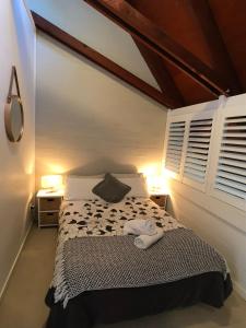 Ein Bett oder Betten in einem Zimmer der Unterkunft Treetops Everglades Villa