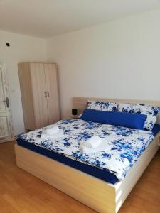 Postel nebo postele na pokoji v ubytování Apartman JulRich