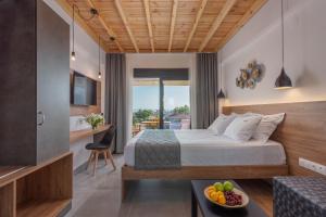 Postel nebo postele na pokoji v ubytování Dandelion Suites
