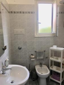 Kylpyhuone majoituspaikassa Alemare