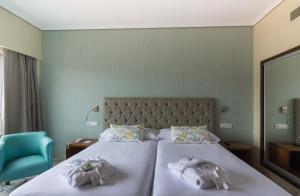 Кровать или кровати в номере Hotel Bahía de Vigo
