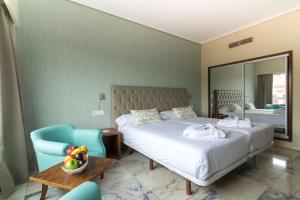 Кровать или кровати в номере Hotel Bahía de Vigo