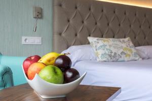 Кровать или кровати в номере Hotel Bahía de Vigo