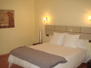 Postel nebo postele na pokoji v ubytování Hotel Oasis Familiar + 30 fotografií