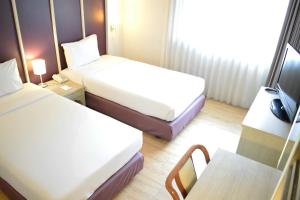 Postel nebo postele na pokoji v ubytování Trang Hotel Bangkok - SHA Plus