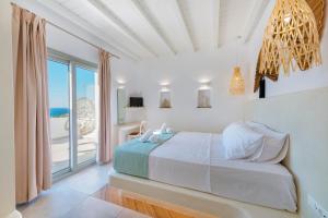 A bed or beds in a room at Aelion Villa